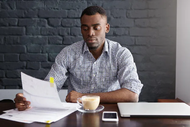 Buyer reviewing supplier documents and pricing details during the RFQ process